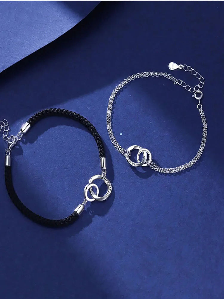 Exquisite couple bracelet with a pair of interlocking rings