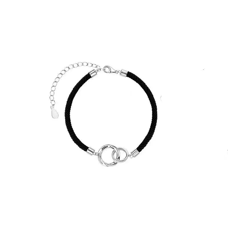 Exquisite couple bracelet with a pair of interlocking rings